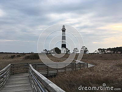 Boardwalk through marsh to the Bodie Lighthouse in Nags Head, North Carolina Stock Photo