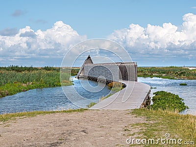 Boardwalk path to bird hide on manmade island Marker Wadden in Markermeer, Netherlands Stock Photo