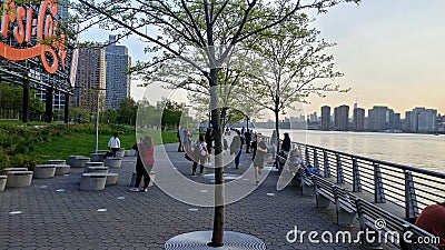 Boardwalk by the river dock in Long Island City Editorial Stock Photo