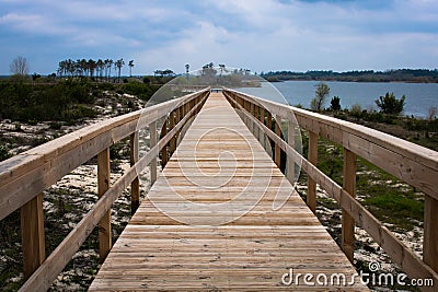 Boardwalk with view over lagoon Stock Photo