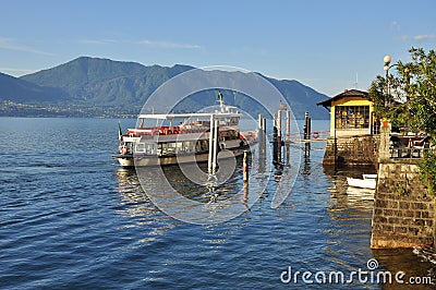 Boat approaching Cannero Riviera, Lake - lago - Maggiore, Italy. Stock Photo