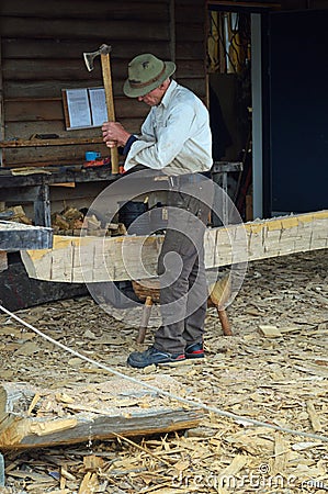 Boat Builder working at The Viking Ship Museum, Roskilde, Denmark Editorial Stock Photo