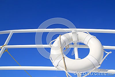 Boat buoy white hanged in railing summer blue sky Stock Photo