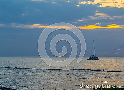 Boat on the Caribbean sea at sunset at Grand Palladium at night Editorial Stock Photo