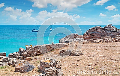 Boat and clouds in Tharros Stock Photo