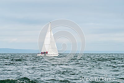 Boat competitor of sailing regatta. Stock Photo