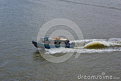 Boat conveying people to work in Victoria Island, Lagos Stock Photo