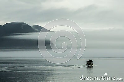 Boat Cruising The Inside Passage Stock Photo