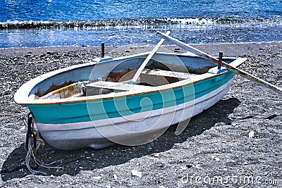 Rowboat On Deserted Sicilian Beach Stock Photo