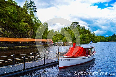 Boat in a dock port in Loch Katrine Katrine Lake in Highland Editorial Stock Photo