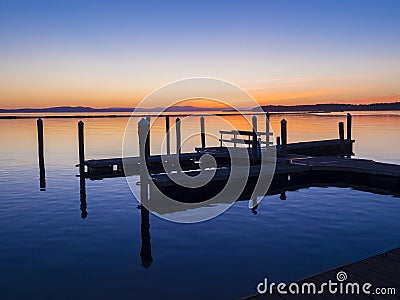 Boat dock at sunset Stock Photo