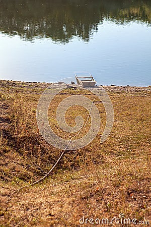 Boat drowned on the shore Stock Photo