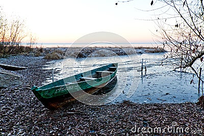 Boat froze in ice Stock Photo