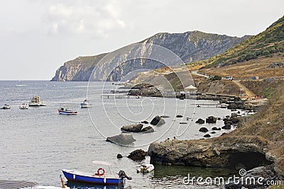 Boat and harbour of Marettimo island. Egadi, Sicily, Italy Stock Photo