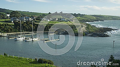 Boat harbour and seaside town Stock Photo