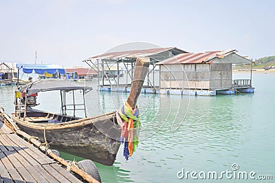 Boat and terrace near the sea Stock Photo