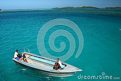 Boat hover on turquoise blue ocean Editorial Stock Photo