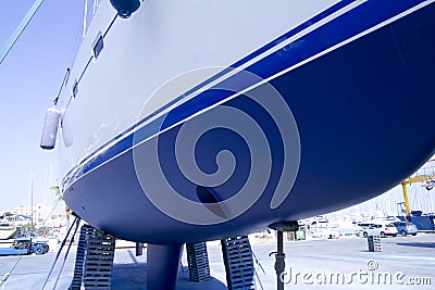 Boat hull sailboat blue antifouling beached Stock Photo