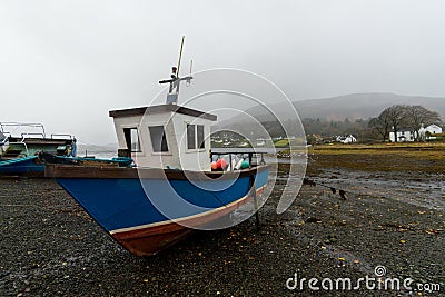 Boat by the lake from Portree Skye island Stock Photo