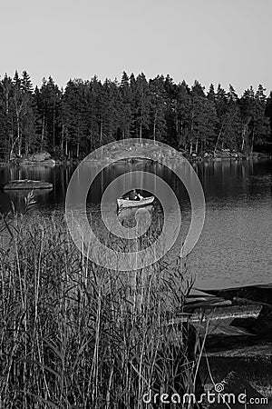 Boat on a lake in Sweden Editorial Stock Photo
