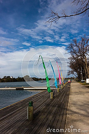 Boat Launching Ramp with Colourful Flags Stock Photo