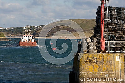 Boat leaving Padstow harbour Cornwall Editorial Stock Photo