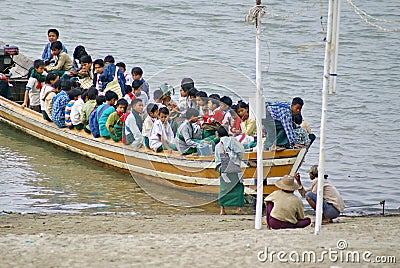 Burmese people on a boat Editorial Stock Photo