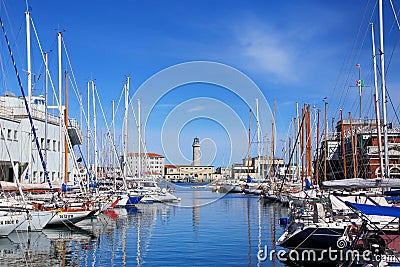 Boat marina and lighthouse in Trieste, Italy Editorial Stock Photo