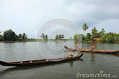 Boat men engage in the sand mining Editorial Stock Photo