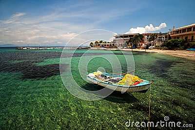 Boat moored on the beach Stock Photo