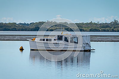 Boat moored in Pumicestone Passage, near Brisbane, Queensland, Australia Stock Photo