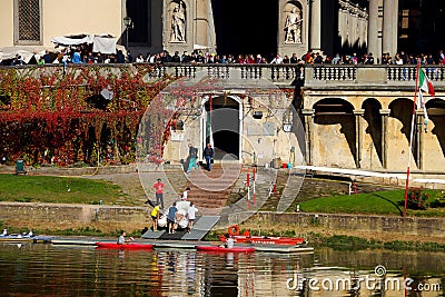 The boat people near Arno River Editorial Stock Photo