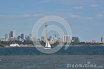 Boat with red rimmed spinnaker sails Toronto harbour Editorial Stock Photo