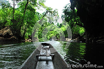 A boat ride through the Kong Lor Cave in central Laos Stock Photo