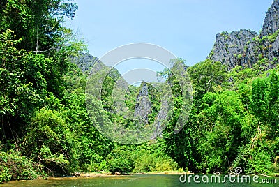 A boat ride on the other side of Kong Lor Cave in Central Laos Stock Photo