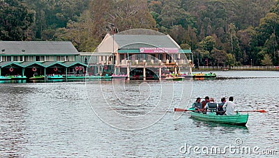 Boat riding a family at the kodaikanal lake near the boat house. Editorial Stock Photo