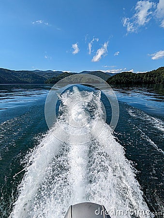 Boat riding on lake jocassee north carolina in summer Stock Photo