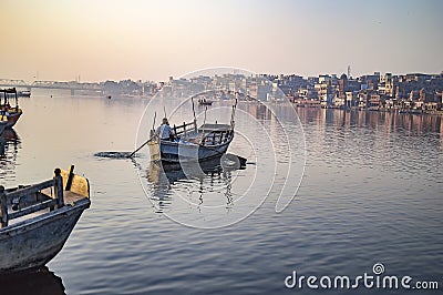 Boat in the river and being rowed Stock Photo