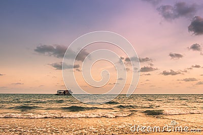 The boat sailed in the sea is beautiful as heaven. Stock Photo
