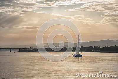 Boat sailing at dawn along the Lima river Stock Photo