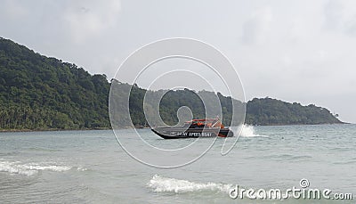 Boat sails from the paradise coconut island Editorial Stock Photo