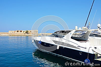 Boat and San Nicolo Bastion, Chania. Editorial Stock Photo