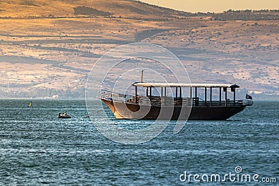 Boat in the Sea of Galilee in early morning Editorial Stock Photo