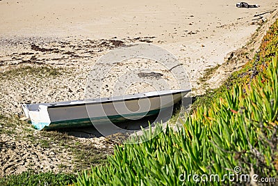 Boat shipwrecked on a beach, California Stock Photo