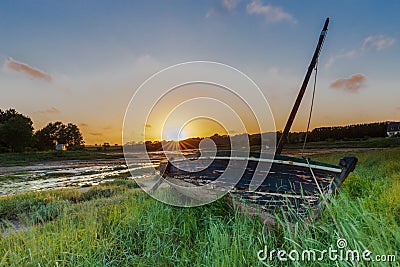 Boat stranded in the grass Stock Photo