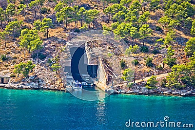 Boat and submarine shelter on Brac island Stock Photo