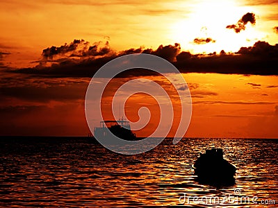 Boat sunset Stock Photo