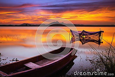 A boat tide at the lake Stock Photo