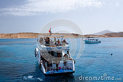 Boat with tourists near the Tiran Island Editorial Stock Photo