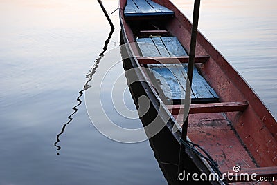 Boat in tranquil river Stock Photo